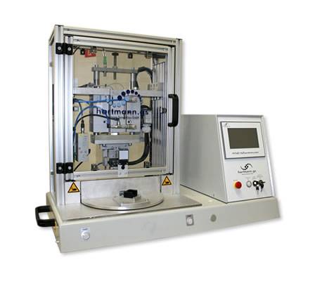  Klassisches Heißverstemmgerät bei dem die zu bearbeitenden Produkte über den Drehteller der Bearbeitung zugeführt werden.